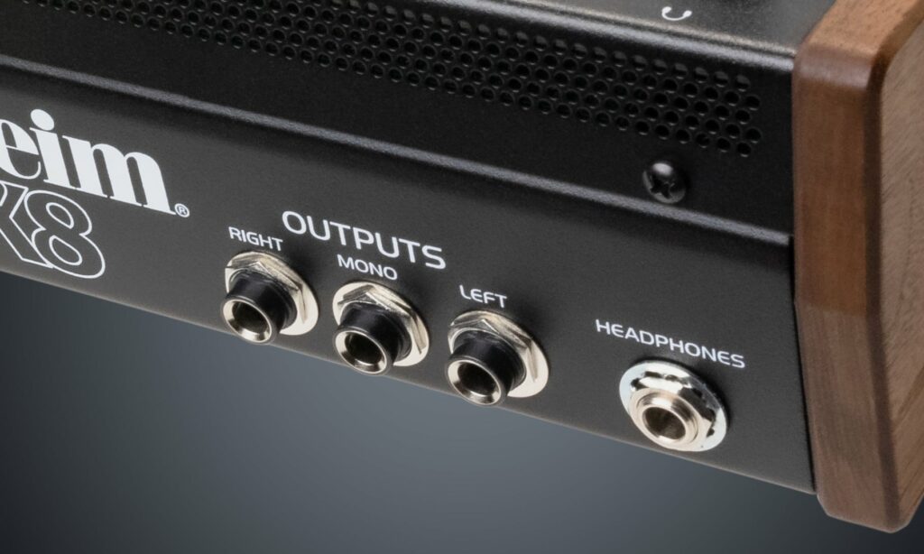 An Image of the OB-X8 Desktop Module rear panel focusing in on the Outputs section.